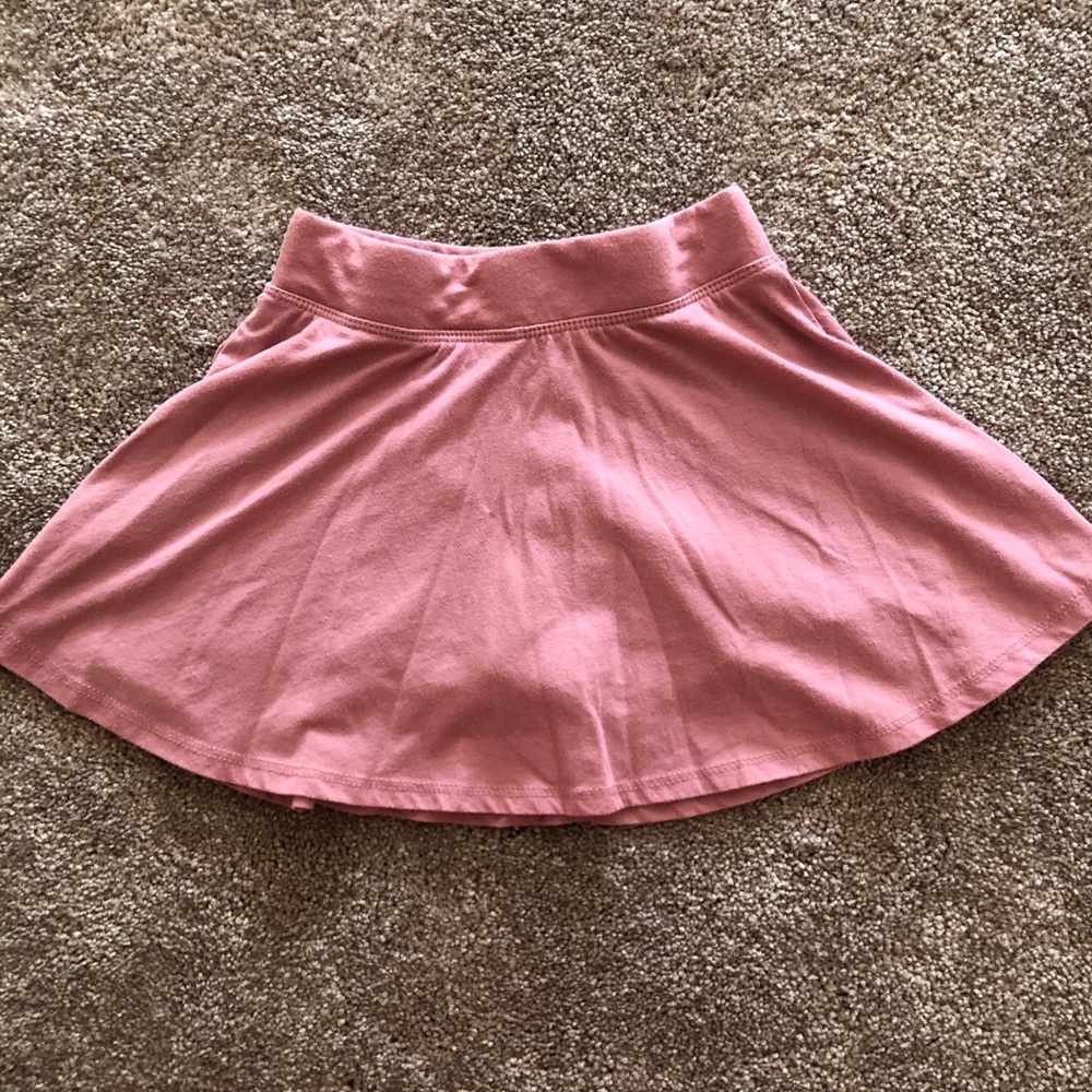 Girls size 7/8 skirt with shorts underneath.